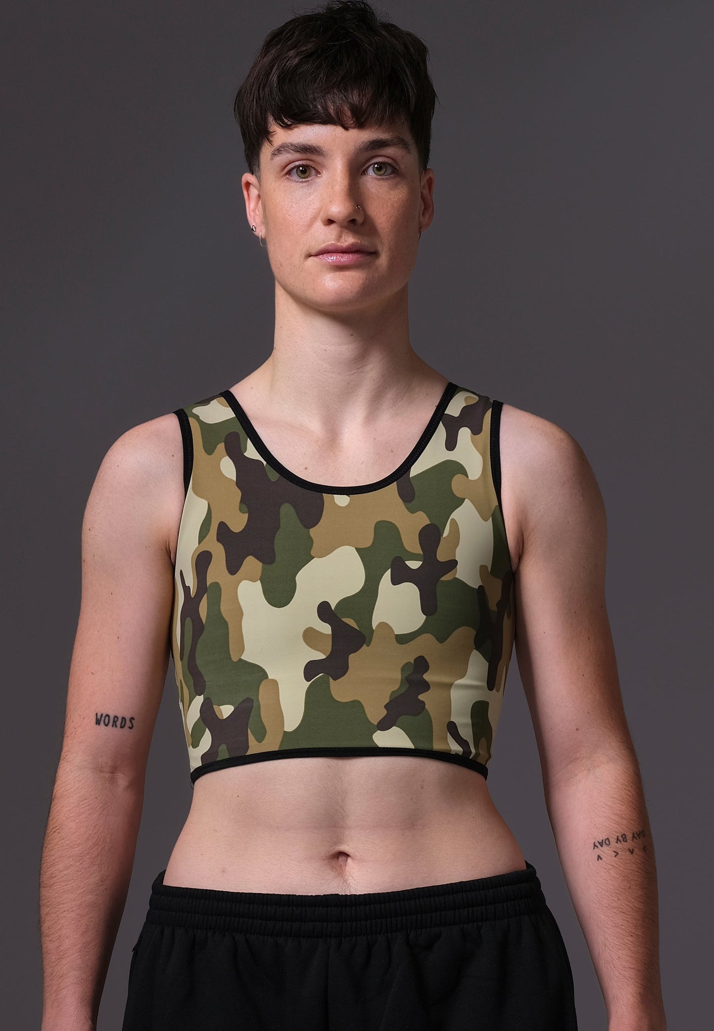 UNTAG trans ftm non binary chest binder camouflage short binder print top model front