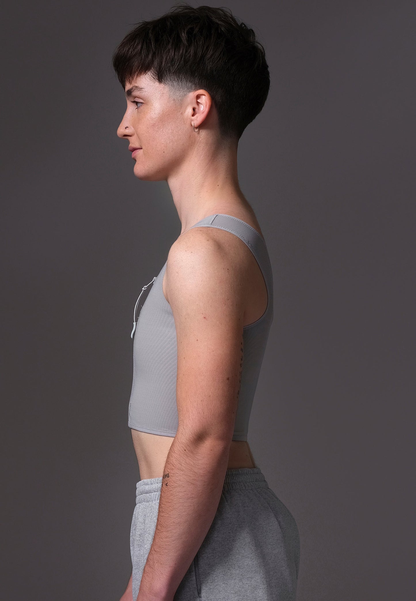 UNTAG ftm chest binder trans non binary underwear basic zipper grey model side