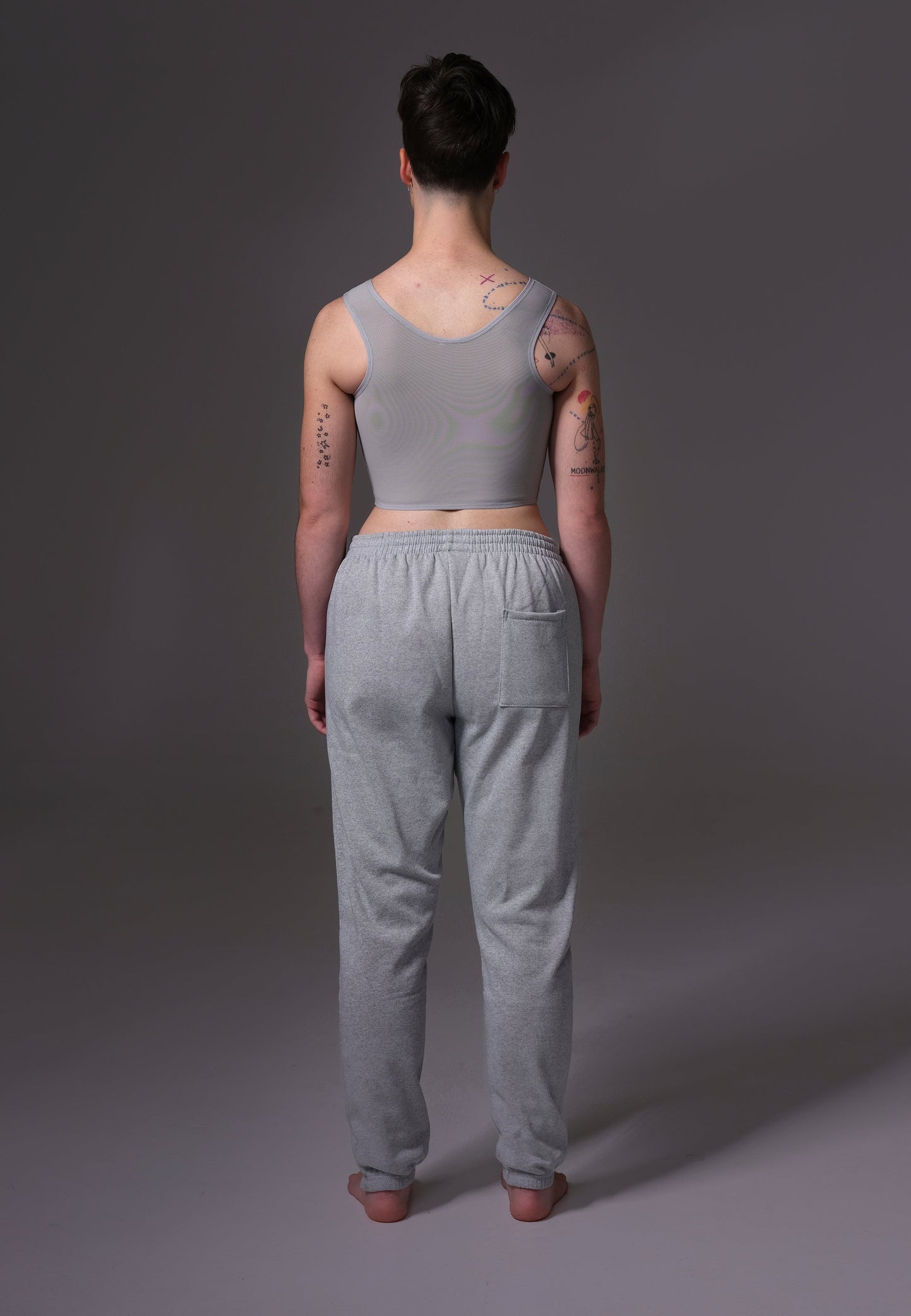 UNTAG ftm chest binder trans non binary underwear basic zipper grey model back 1