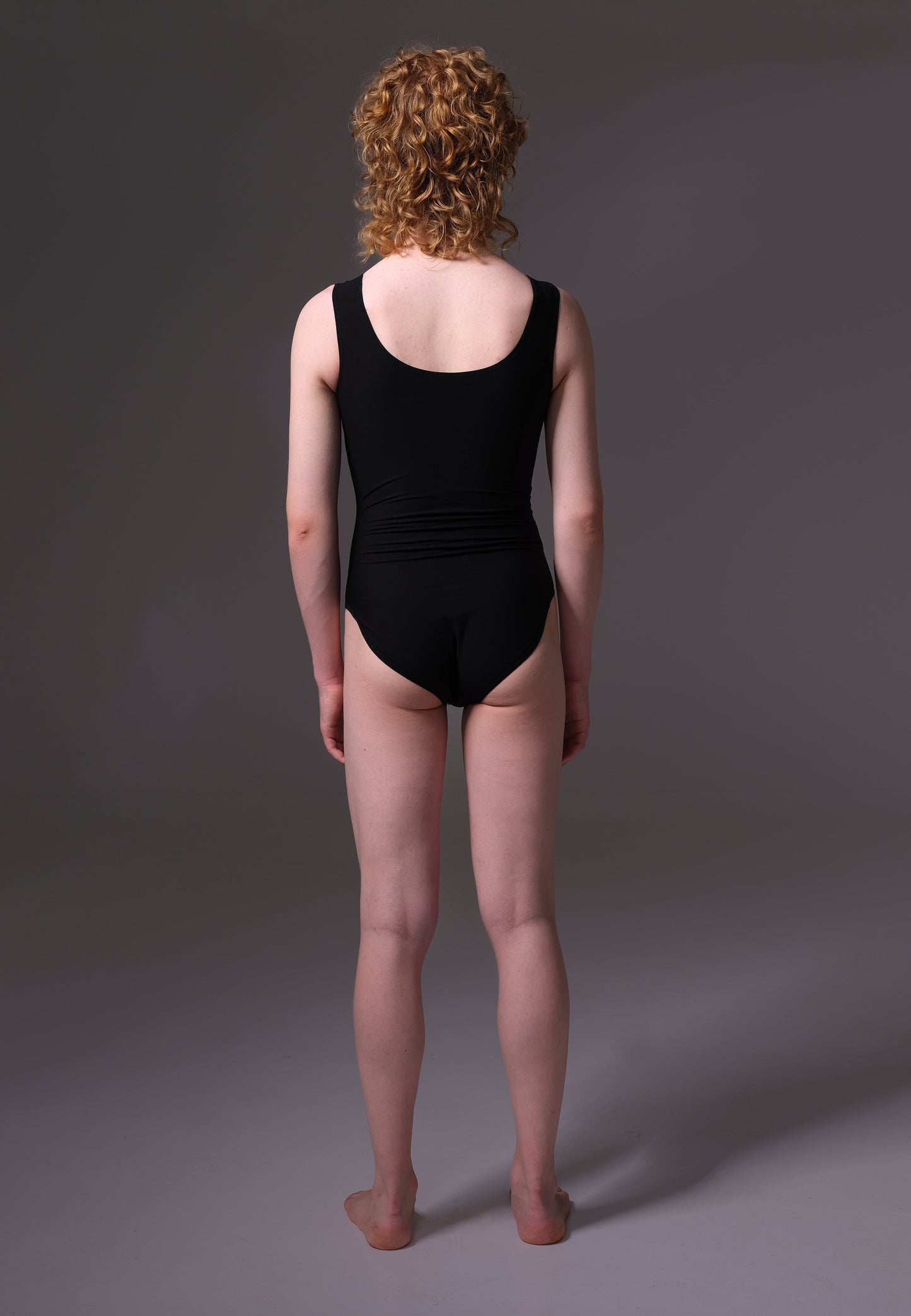 UNTAG MtF trans femme underwear tucking swimsuit black model back