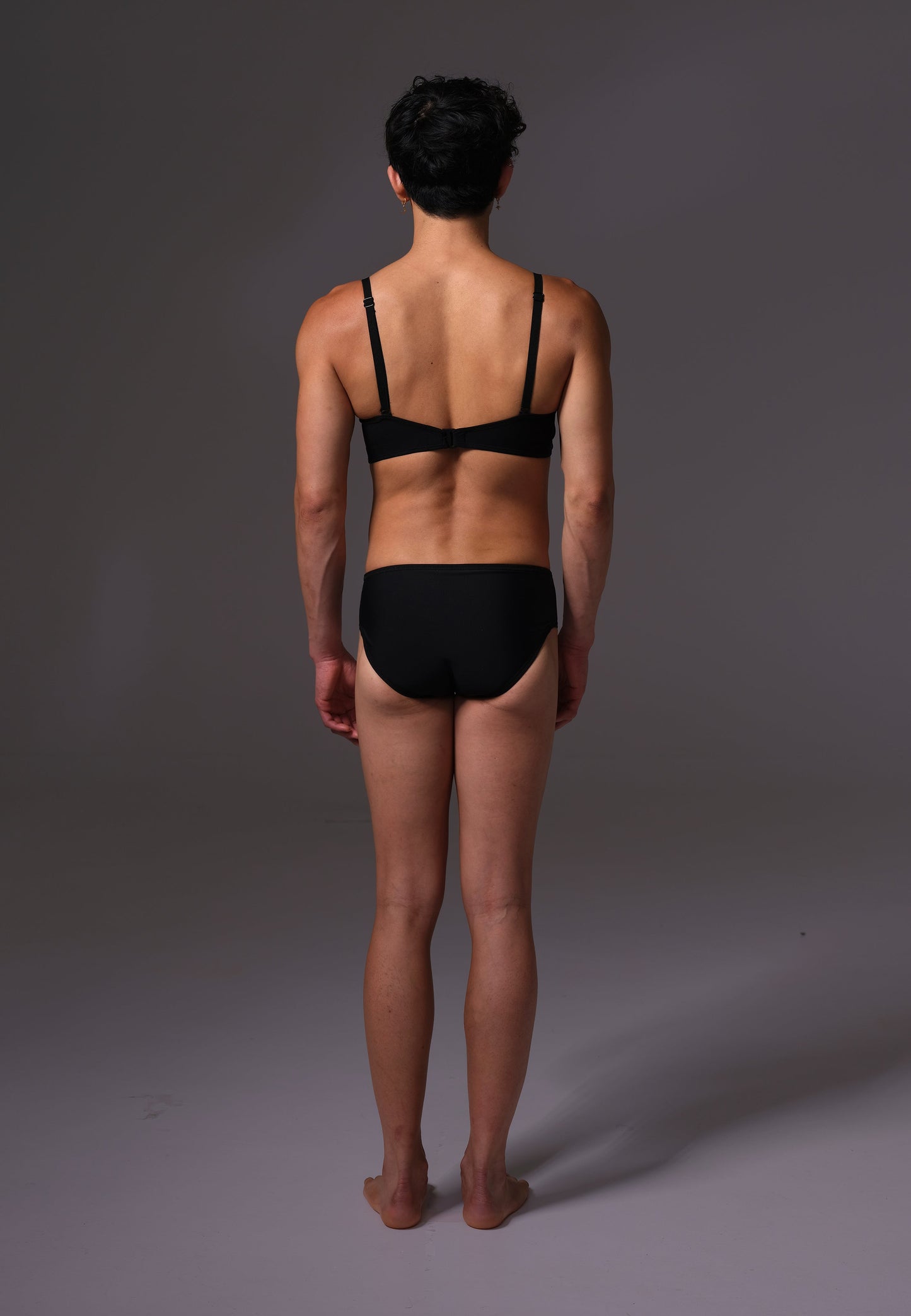 MtF trans femme UNTAG black bikini top back model