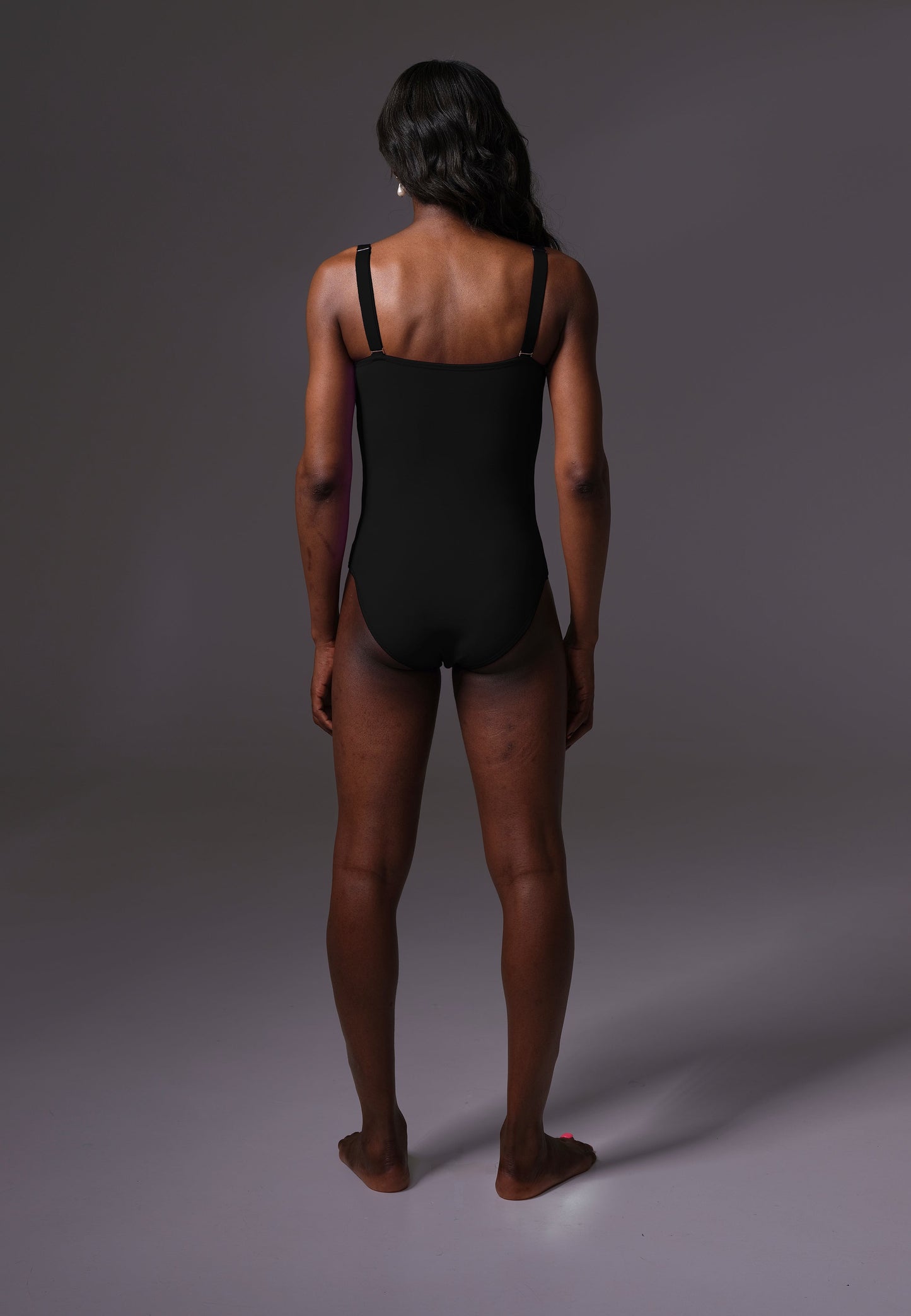 UNTAG MtF trans femme Strappy One Piece black prosthetic boobs back front model