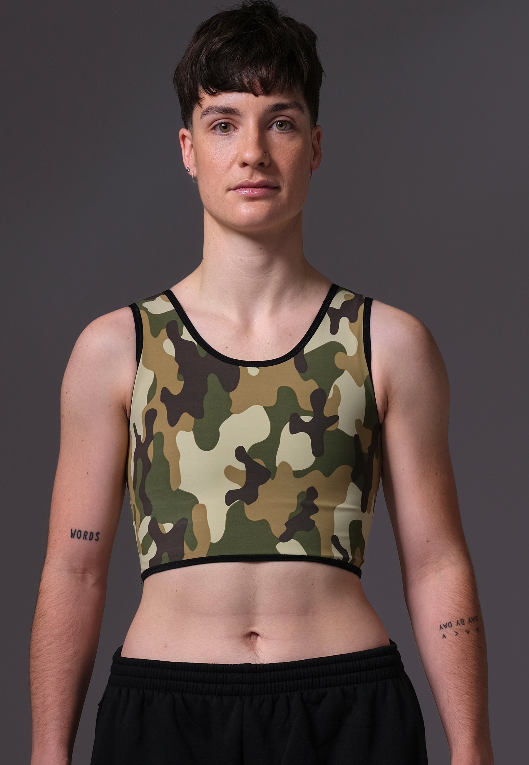 UNTAG trans ftm non binary chest binder camouflage short binder print top model front