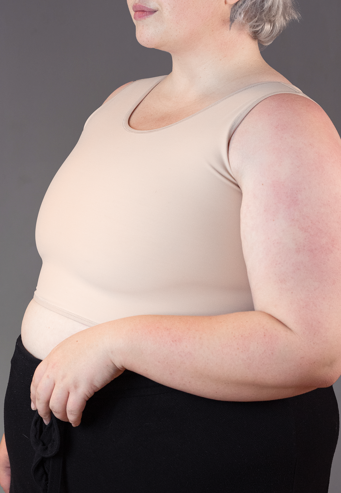 UNTAG trans masc FtM non binary short chest binder extra strong beige close up 1