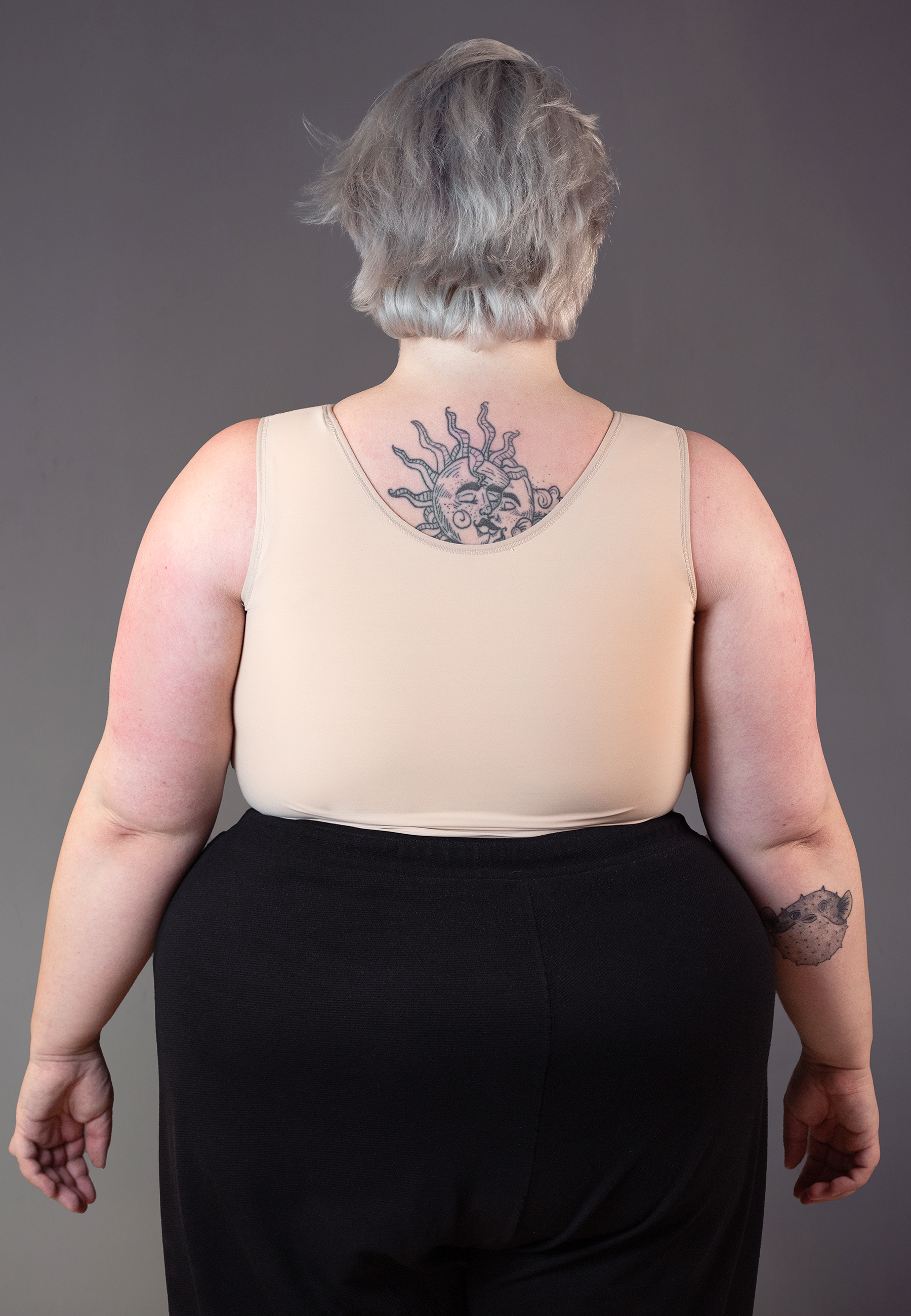 UNTAG trans masc FtM non binary short chest binder extra strong beige 4 back model