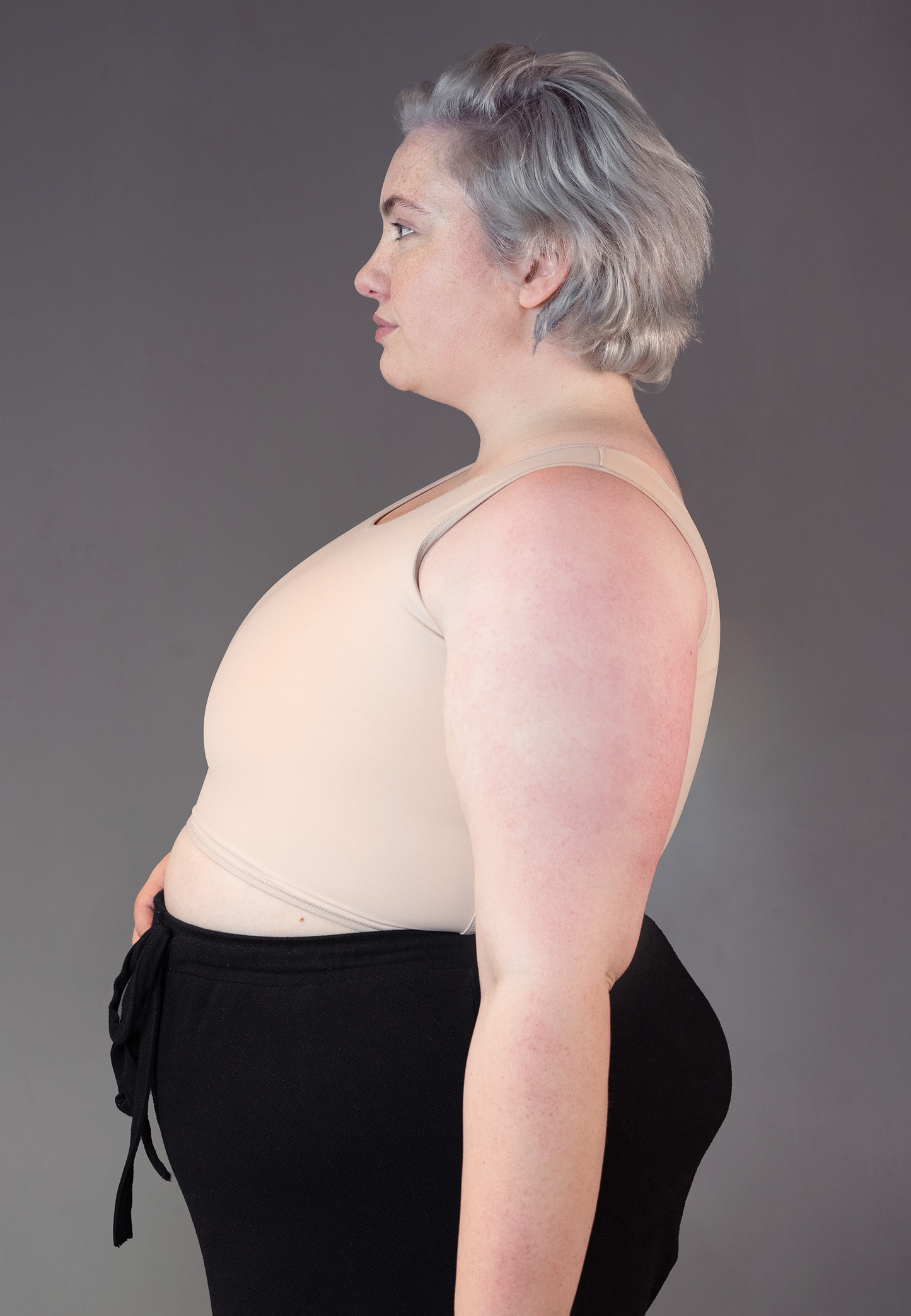 UNTAG trans masc FtM non binary short chest binder extra strong beige 3 side model