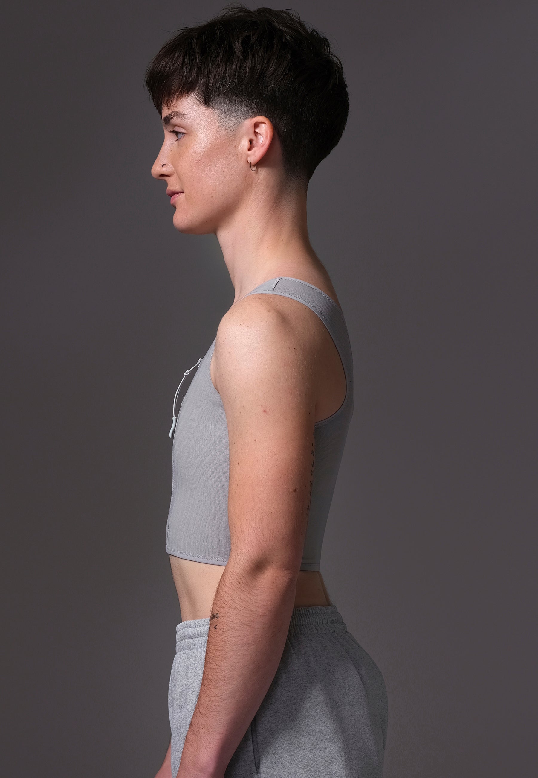 UNTAG ftm chest binder trans non binary underwear basic zipper grey model side