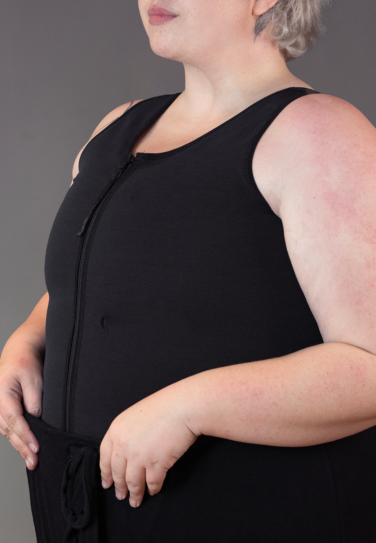 UNTAG FTM trans masc non binary chest long binder singlet with zipper black close up