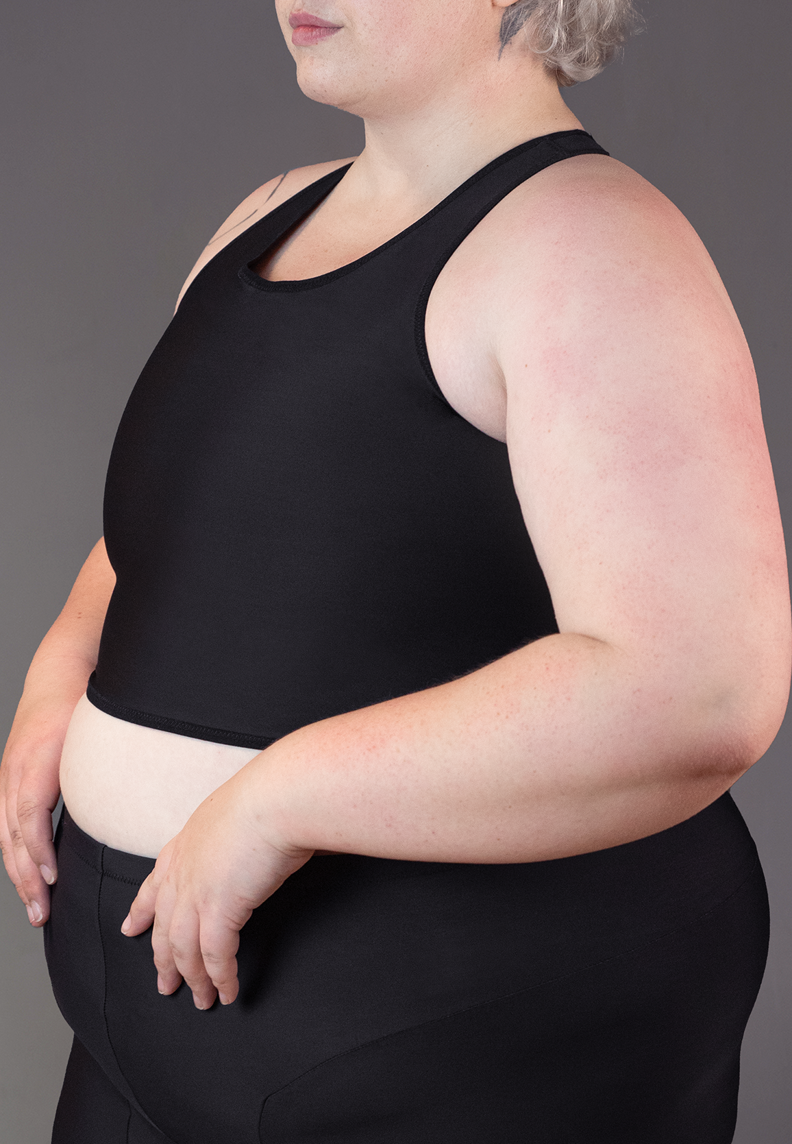 UNTAG Tank Swim chest binder black FTM trans masc non binary swimtop close up