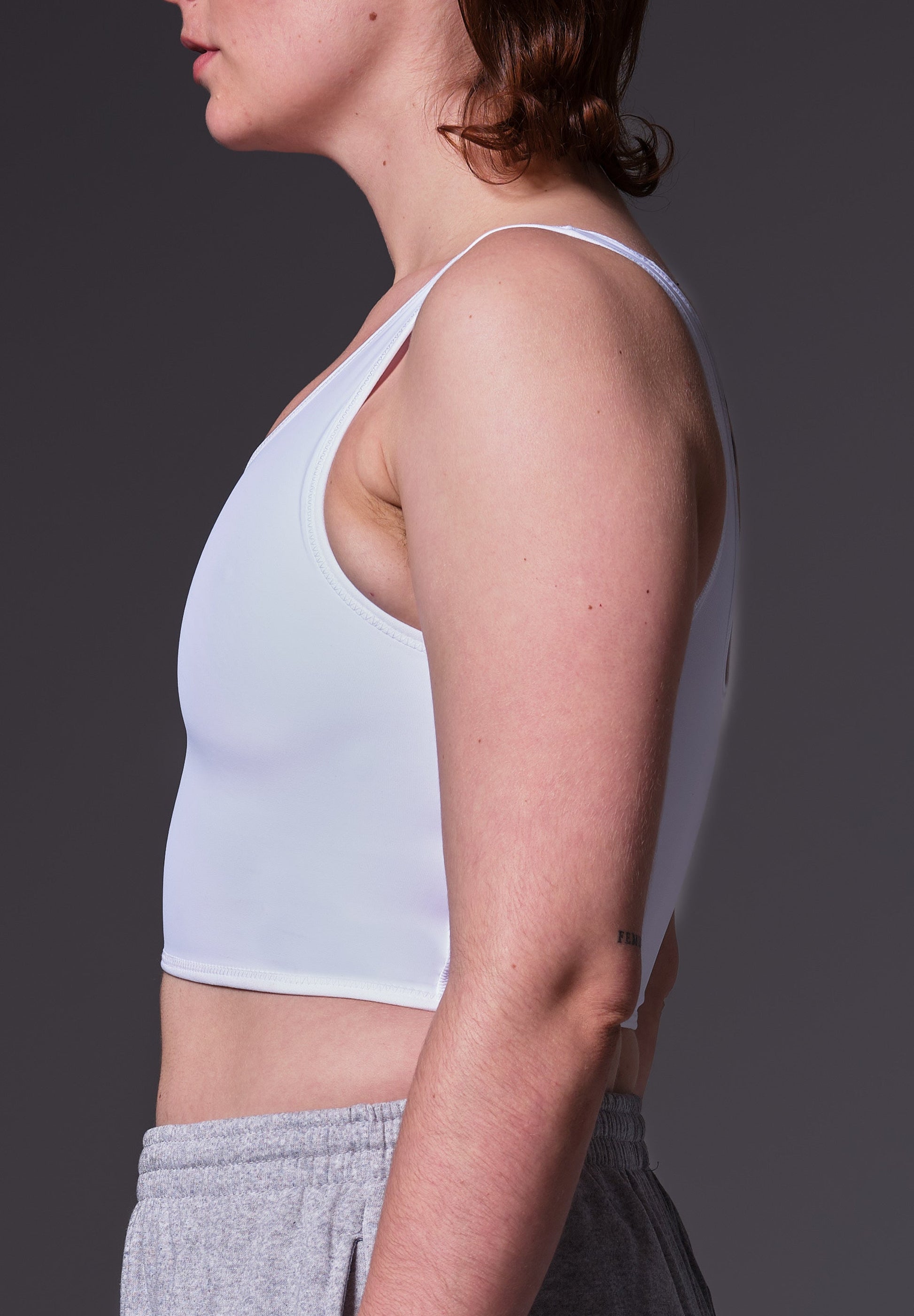 Gym Binder white side view on model Lene
