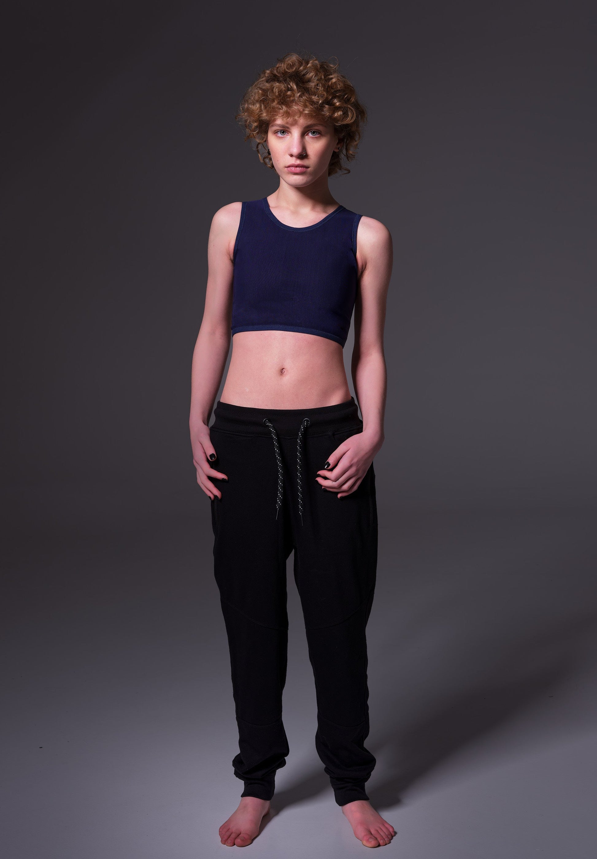 Lo wearing the Basic Swim Binder dark blue by UNTAG