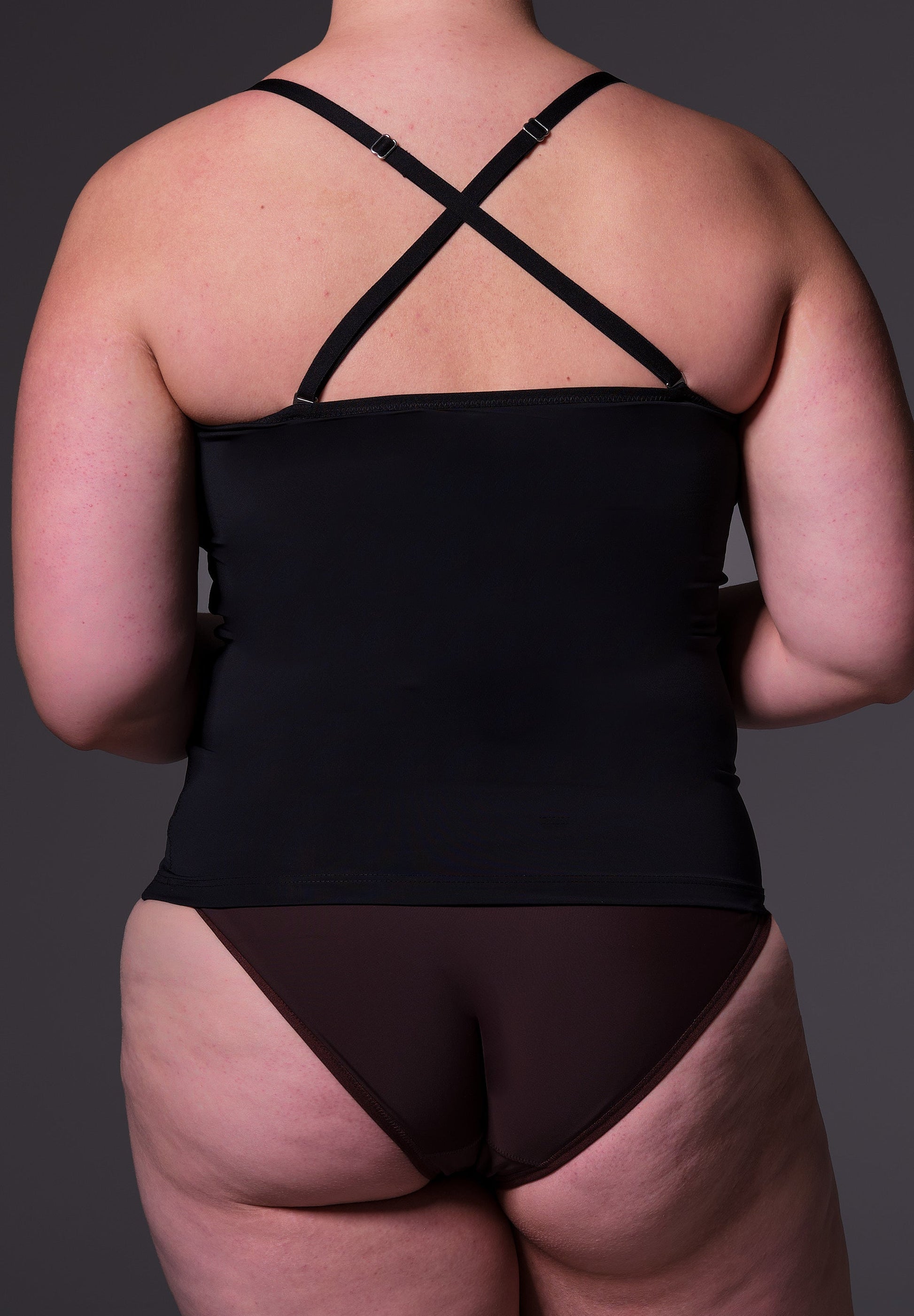 Singlet Advanced black, back view on model Sasha