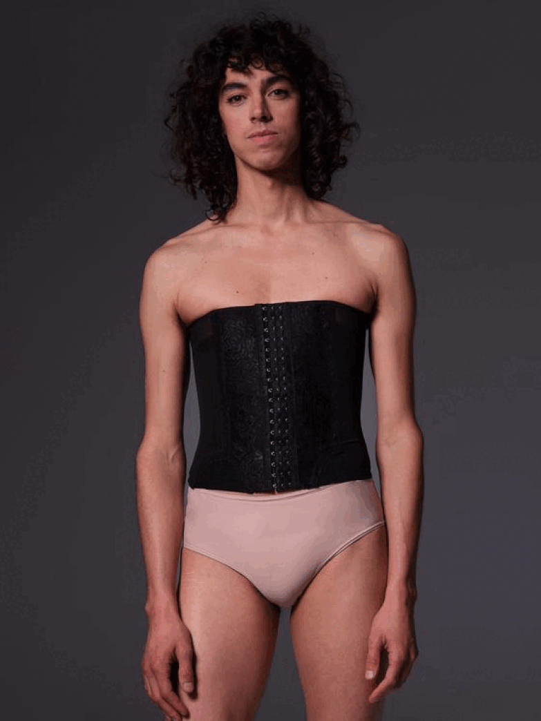 Riah wears the corset in black and the slip Maria