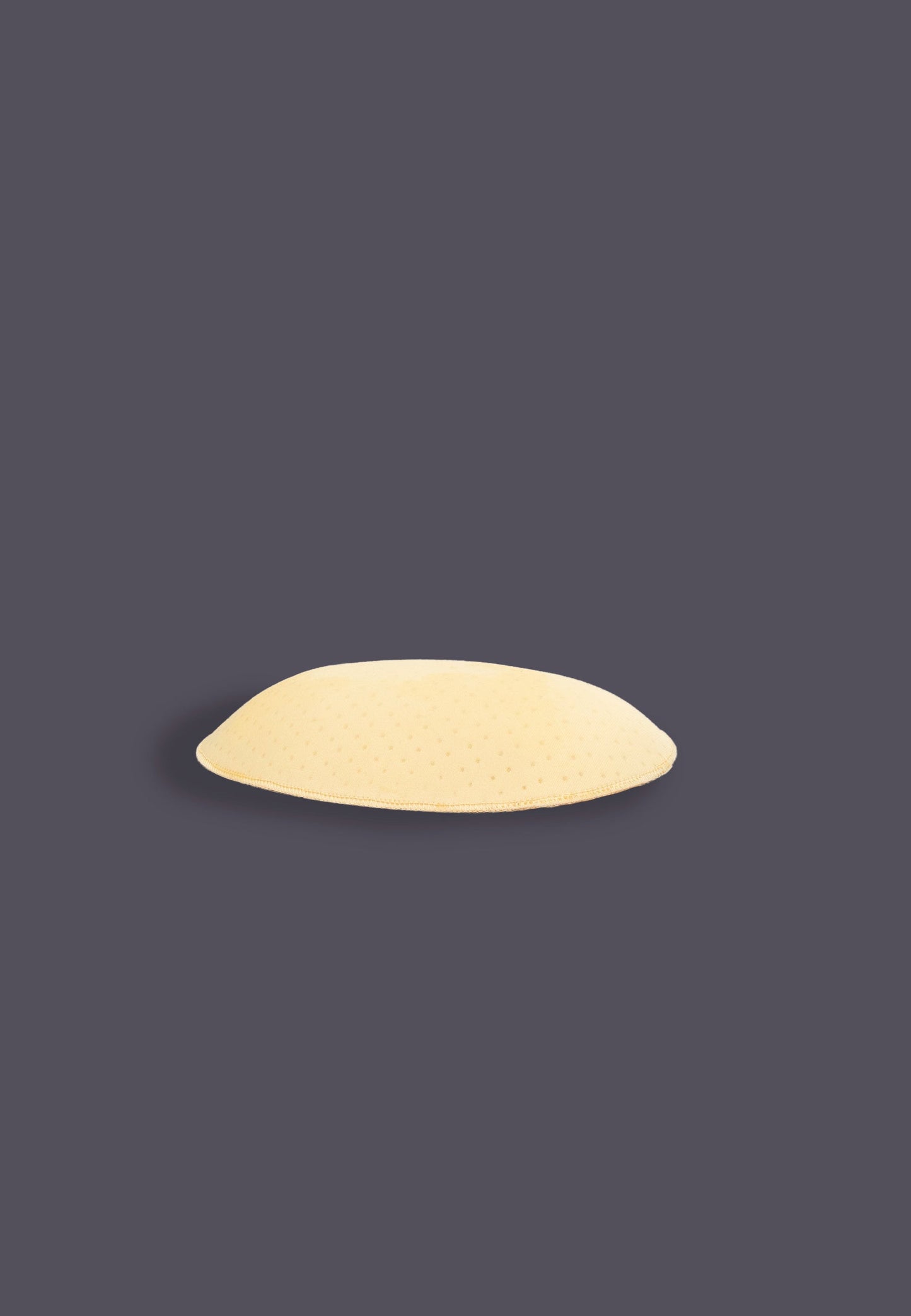 One of the Foam Self-Adhesive Hip Pads beige seen from the side